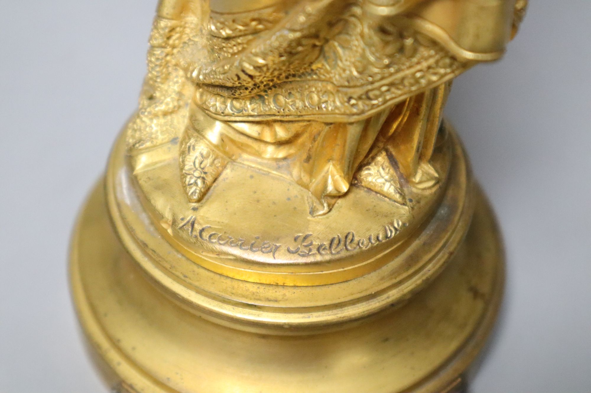 After Carrier-Belleuse. A gilt bronze and ivory figure, height 25cm